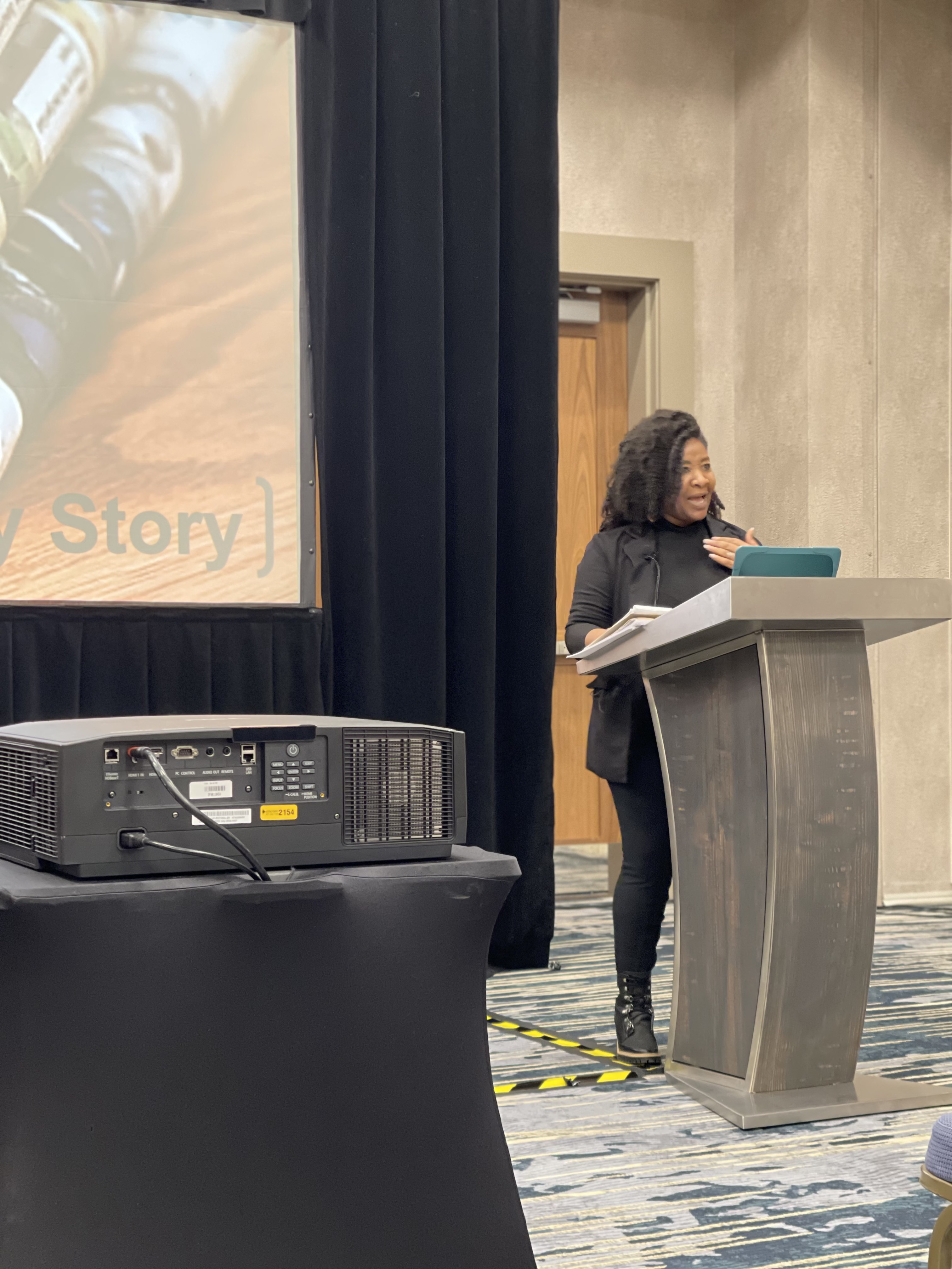Candace presenting to an audience