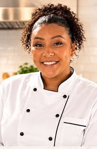 Katie in a white chef jacket