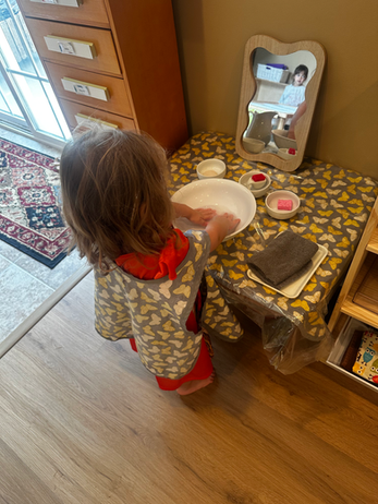 A child practicing an everyday activity