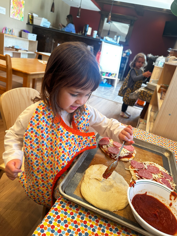 A child working with cooking materials