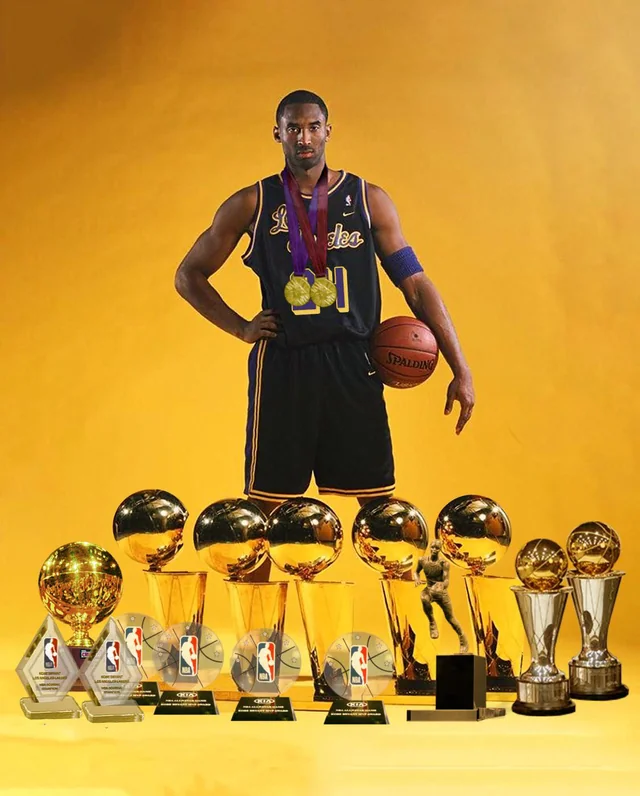 Kobe Bryant with Trophies